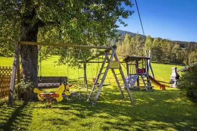 Ein Kinderspielbereich in der Unterkunft Vordersattlegghof