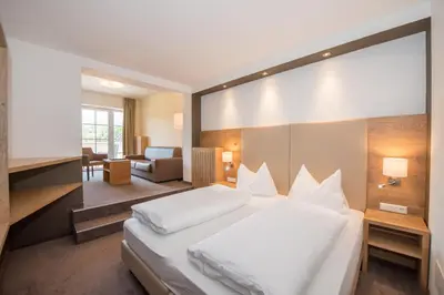 Ein Bett oder Betten in einem Zimmer der Unterkunft Spa&Aktiv Hotel Lavendel