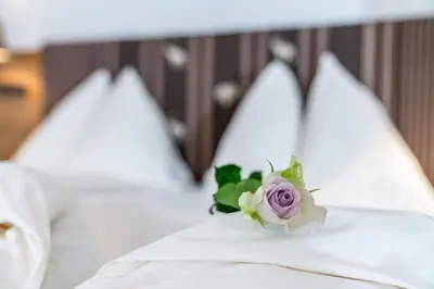 Ein Bett oder Betten in einem Zimmer der Unterkunft Hotel Pehab - Dachstein Rooftop-Spa