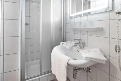 Ein Badezimmer in der Unterkunft Pension Bartlbauer