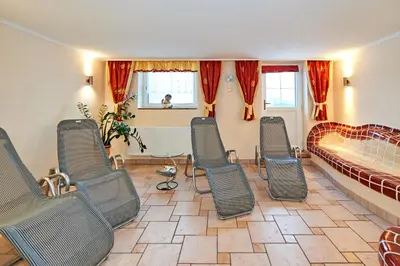 Ein Sitzbereich in der Unterkunft Pension Bartlbauer