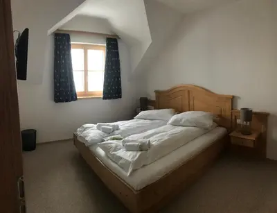 Ein Bett oder Betten in einem Zimmer der Unterkunft Hirschberg