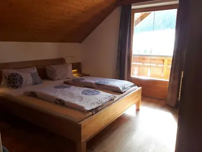 Ein Bett oder Betten in einem Zimmer der Unterkunft Lungau Apartment - Ferienwohnung Haus Esl