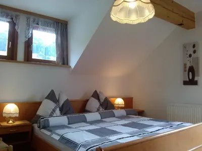 Ein Bett oder Betten in einem Zimmer der Unterkunft Lungau Apartment - Ferienwohnung Haus Esl