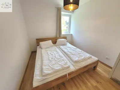 Ein Bett oder Betten in einem Zimmer der Unterkunft Alpine Tauplitz TOP 5