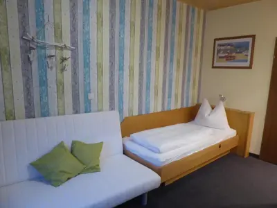 Ein Bett oder Betten in einem Zimmer der Unterkunft Gasthof Blasl