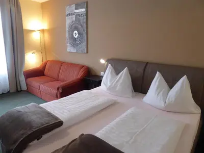 Ein Bett oder Betten in einem Zimmer der Unterkunft Gasthof Blasl