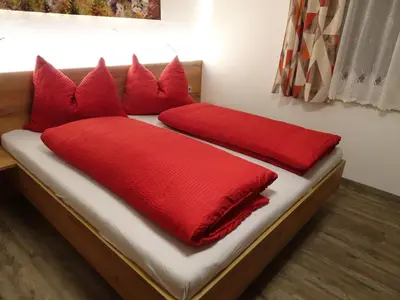 Ein Bett oder Betten in einem Zimmer der Unterkunft Haus Höll Herta