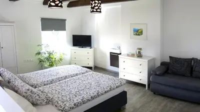 Ein Bett oder Betten in einem Zimmer der Unterkunft Ferienwohnung in Seewalchen
