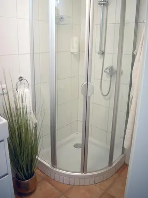 Ein Badezimmer in der Unterkunft Ferienwohnung in Seewalchen