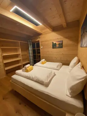 Ein Bett oder Betten in einem Zimmer der Unterkunft Skihütte