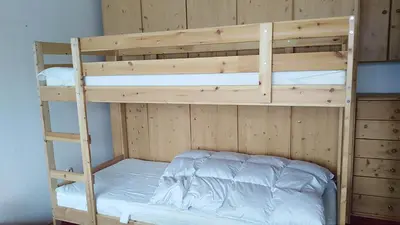 Ein Bett oder Betten in einem Zimmer der Unterkunft Happy Stay Apartment