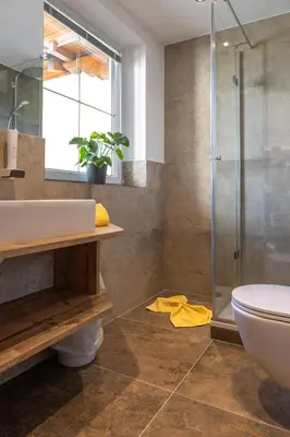 Ein Badezimmer in der Unterkunft Aparthotel DAS Hochkönig