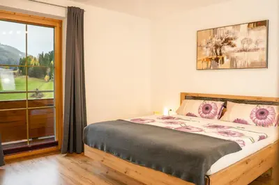 Ein Bett oder Betten in einem Zimmer der Unterkunft Haus Pfeifenberger