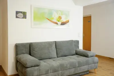 Ein Sitzbereich in der Unterkunft Haus Pfeifenberger