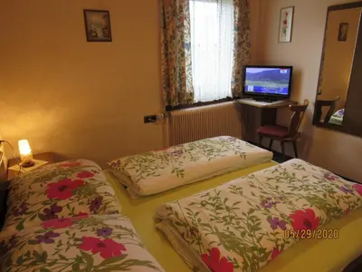 Ein Bett oder Betten in einem Zimmer der Unterkunft Villa Löcker