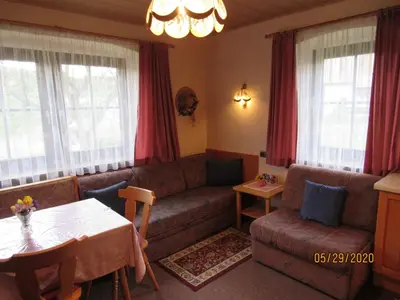 Ein Sitzbereich in der Unterkunft Villa Löcker