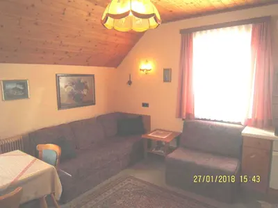 Ein Sitzbereich in der Unterkunft Villa Löcker
