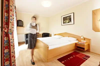 Ein Bett oder Betten in einem Zimmer der Unterkunft Pension Jageredt
