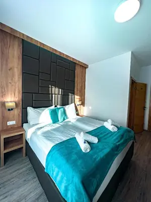 Ein Bett oder Betten in einem Zimmer der Unterkunft Sylpaulerhof Aparthotel