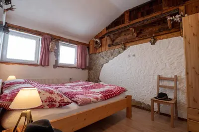 Ein Bett oder Betten in einem Zimmer der Unterkunft Almhaus Dachsteinblick am Feuerkogel