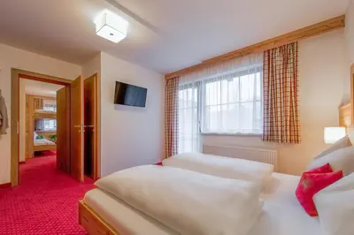 Ein Bett oder Betten in einem Zimmer der Unterkunft Pension Haus am Dorfplatz