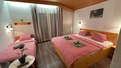 Ein Bett oder Betten in einem Zimmer der Unterkunft Pension INGE
