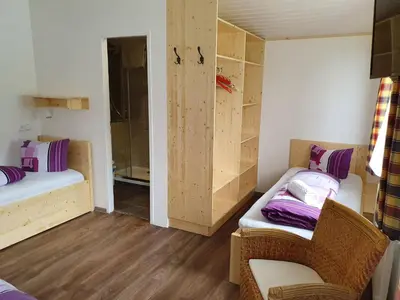 Ein Bett oder Betten in einem Zimmer der Unterkunft Pension INGE