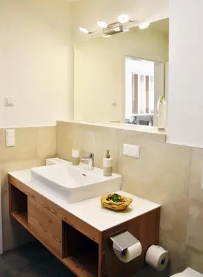 Ein Badezimmer in der Unterkunft TROGER special Appartement