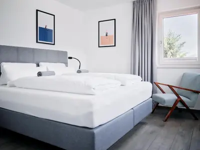 Ein Bett oder Betten in einem Zimmer der Unterkunft ARX Guesthouse