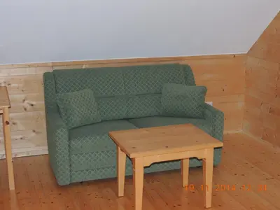 Ein Sitzbereich in der Unterkunft Egghartguthütte
