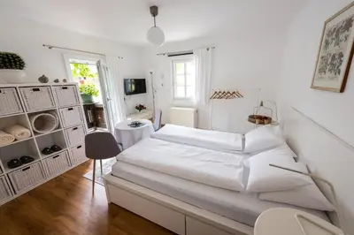Ein Bett oder Betten in einem Zimmer der Unterkunft B&B Haus Hemetzberger