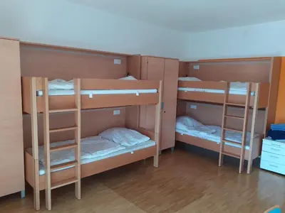 Ein Bett oder Betten in einem Zimmer der Unterkunft Jugendherberge Tamsweg