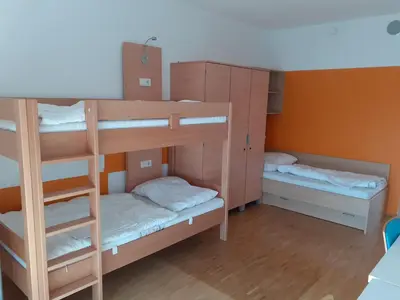 Ein Bett oder Betten in einem Zimmer der Unterkunft Jugendherberge Tamsweg