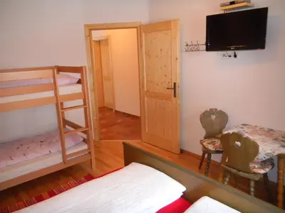 Ein Bett oder Betten in einem Zimmer der Unterkunft Ferienhaus Longa