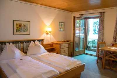 Ein Bett oder Betten in einem Zimmer der Unterkunft Hochberghaus Resort