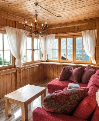 Ein Sitzbereich in der Unterkunft Das Haus am Grundlsee - Your Austrian Home