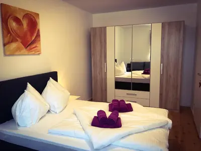 Ein Bett oder Betten in einem Zimmer der Unterkunft Bergblick