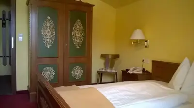 Ein Bett oder Betten in einem Zimmer der Unterkunft Ferienhotel Knollhof