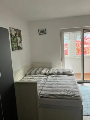 Ein Bett oder Betten in einem Zimmer der Unterkunft Ferienwohnung Haus Cerny