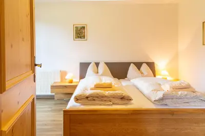 Ein Bett oder Betten in einem Zimmer der Unterkunft Almhaus Alpenrose Postalm