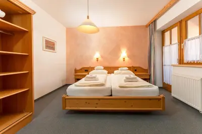 Ein Bett oder Betten in einem Zimmer der Unterkunft Resort Amadeus-Landhaus Amadeus