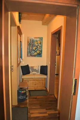 Ein Sitzbereich in der Unterkunft Apartment zum Wasserfall