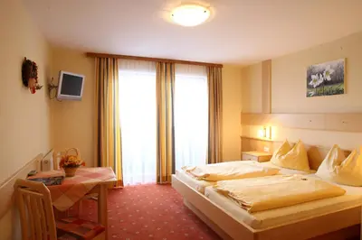 Ein Bett oder Betten in einem Zimmer der Unterkunft Timmelbauerhof