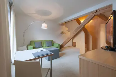Ein Sitzbereich in der Unterkunft Superior Hotel Alpenhof