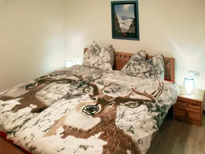 Ein Bett oder Betten in einem Zimmer der Unterkunft Apartment Corona by Interhome