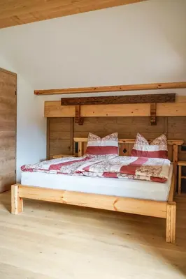 Ein Bett oder Betten in einem Zimmer der Unterkunft Haus am Wald