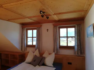 Ein Bett oder Betten in einem Zimmer der Unterkunft Paulbauer