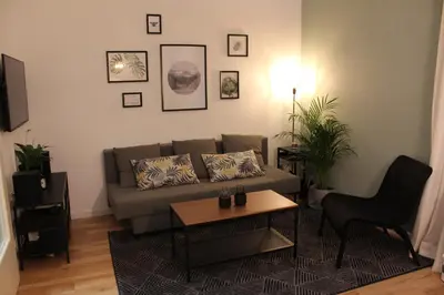 Ein Sitzbereich in der Unterkunft City Apartment Schladming