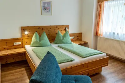 Ein Bett oder Betten in einem Zimmer der Unterkunft Haus Mandl